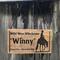 Custom Horse Stall Sign with a Trail horse image, Early American wood stain, and font choice . Hanging with black suede cord